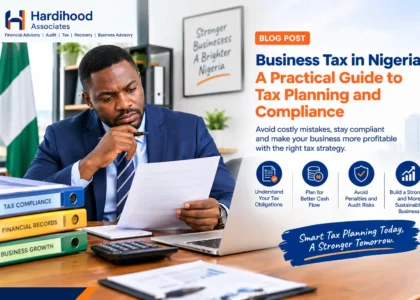 Nigerian business professional reviewing tax compliance documents and financial records